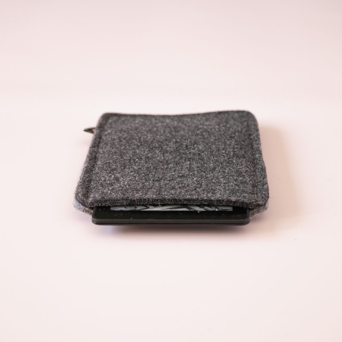 Kindle case made of black and dark gray wool felt