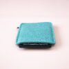 Kindle case made of turquoise blue and dark gray wool felt