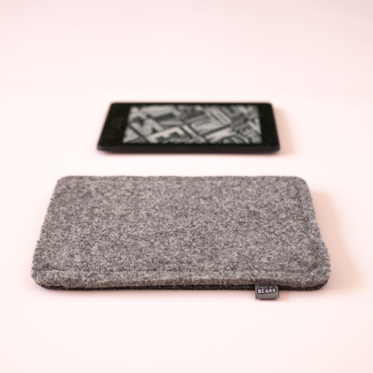 Kindle case made of black and dark gray wool felt