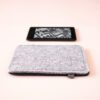 Kindle case made of navy blue and light gray wool felt