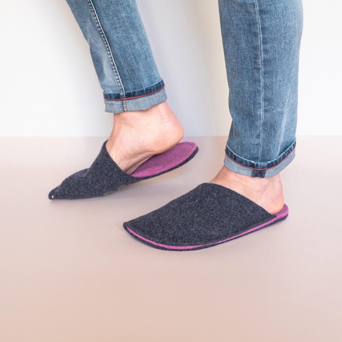 A man wearing navy Blue and Orchid Purple Slippers