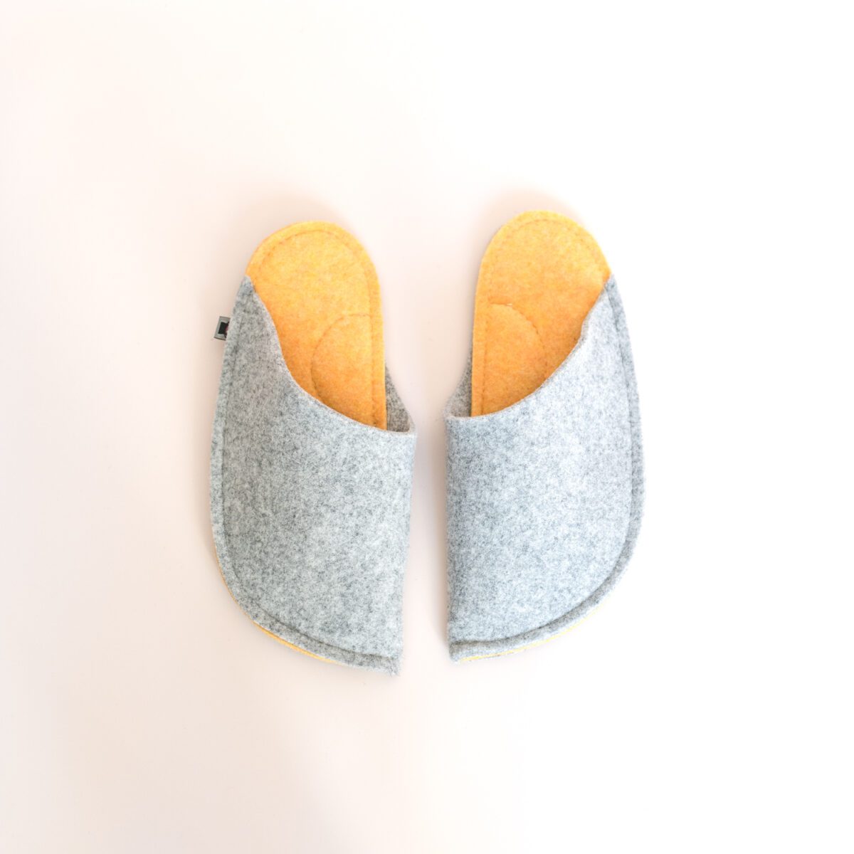 Light gray and peach yellow house slippers