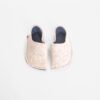 Cream white and navy blue slippers with a closed back