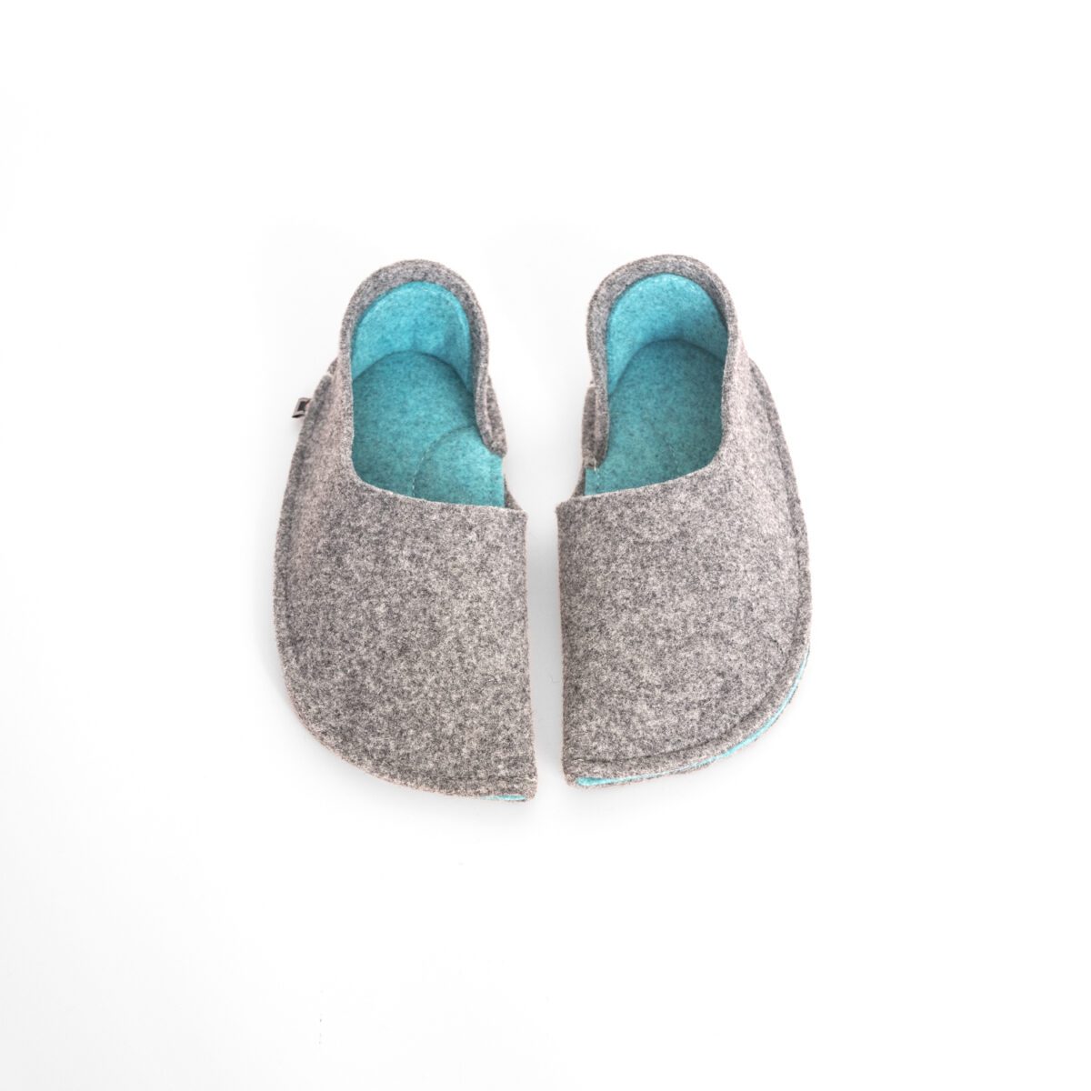 Dark gray and turquoise blue slippers with a closed back