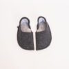 Black and light gray slippers with a closed back