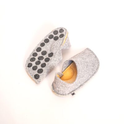 Light gray and peach yellow slippers with a closed back